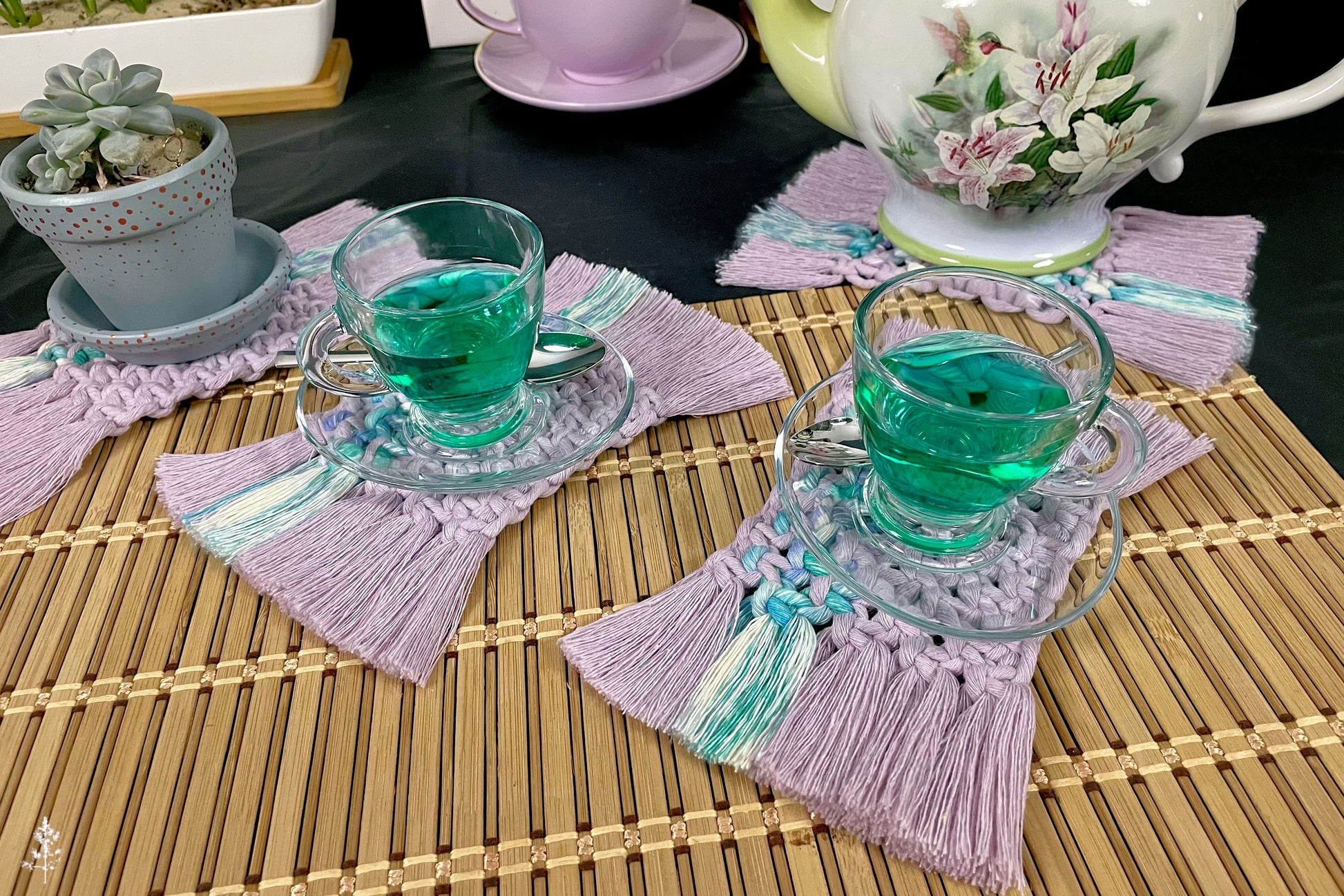 Tea set and macrame coasters in lavender cotton rope with a succulent on the table